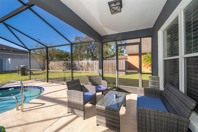 sunroom / solarium featuring a swimming pool