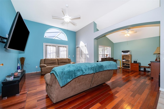 bedroom featuring multiple windows, ceiling fan, and dark hardwood / wood-style floors