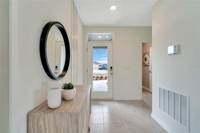 entrance foyer with light tile patterned flooring