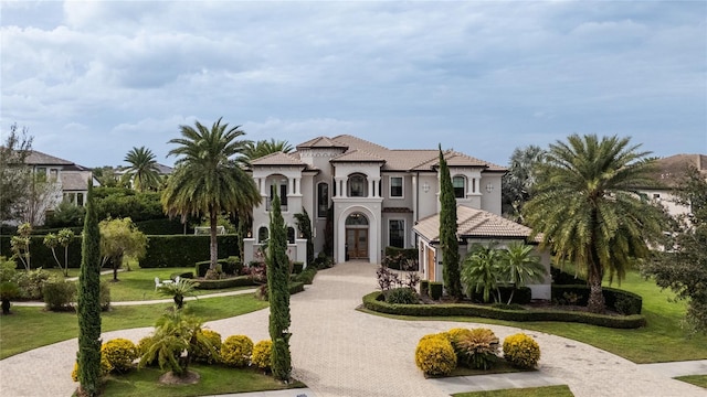 view of front of property with a front lawn