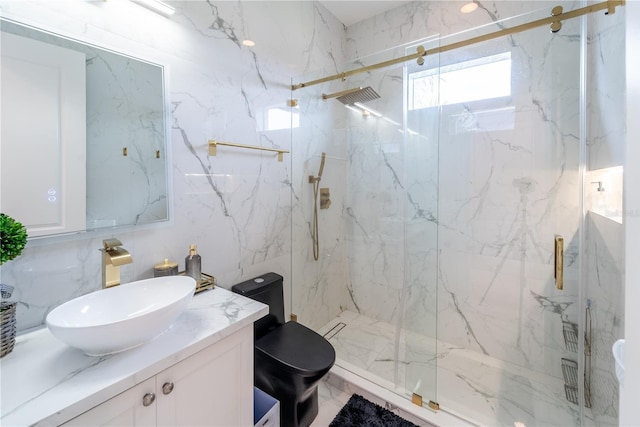 bathroom with an enclosed shower, vanity, toilet, and tile walls