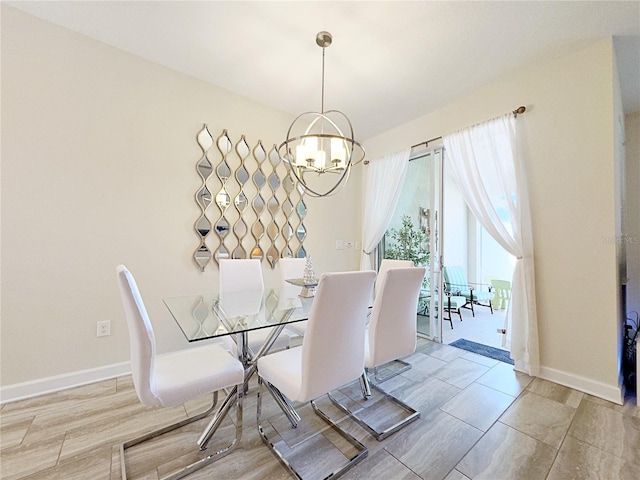 dining room featuring a notable chandelier