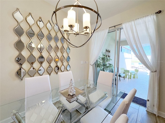 dining area featuring a chandelier