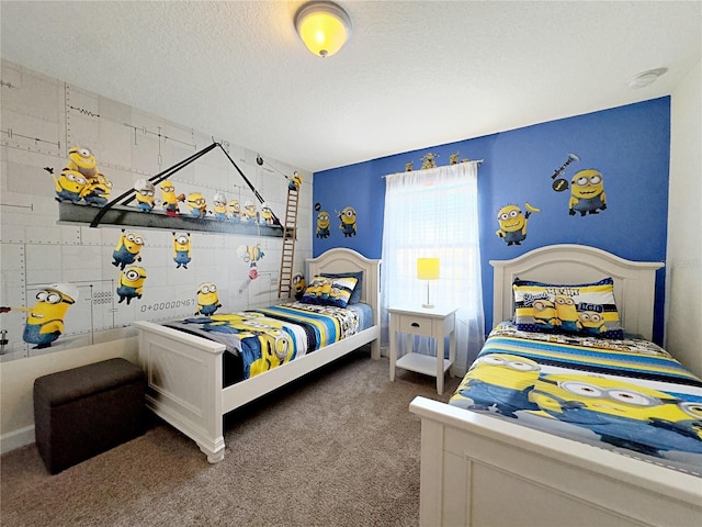 carpeted bedroom with a textured ceiling