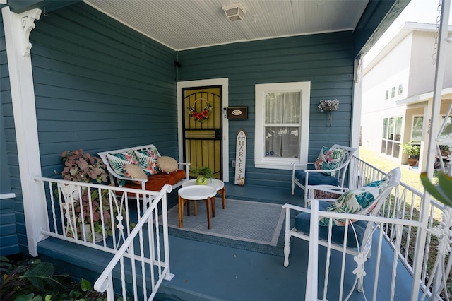 doorway to property featuring a porch