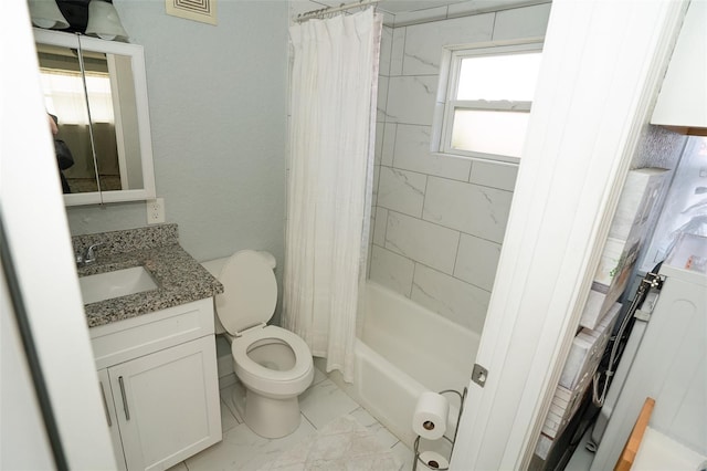 full bathroom with shower / tub combo with curtain, vanity, and toilet