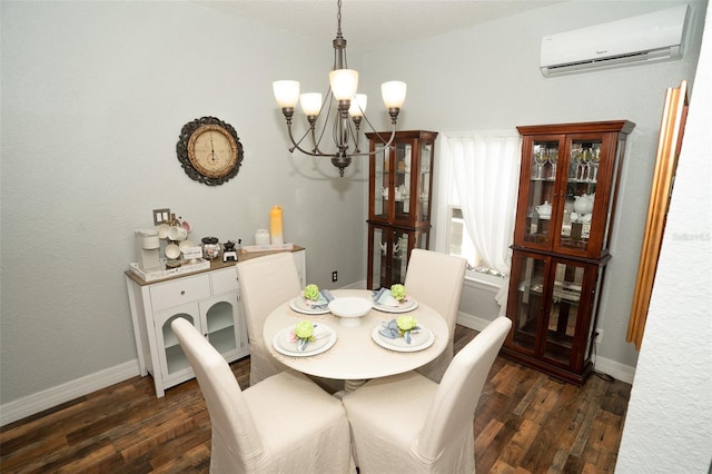 dining space featuring dark hardwood / wood-style floors, an AC wall unit, and a notable chandelier