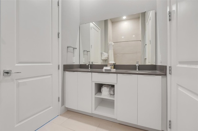 bathroom featuring vanity and tile patterned flooring