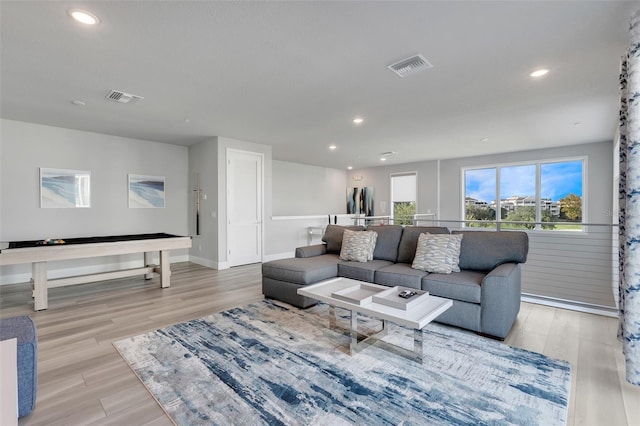 living room featuring light hardwood / wood-style floors