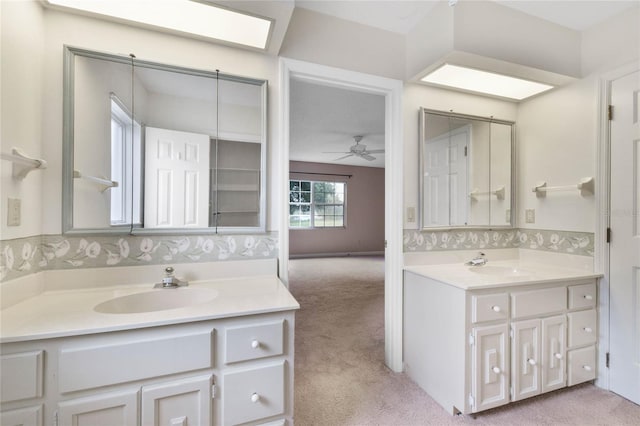 bathroom with vanity and ceiling fan