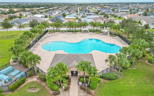 view of pool featuring a patio area and a lawn