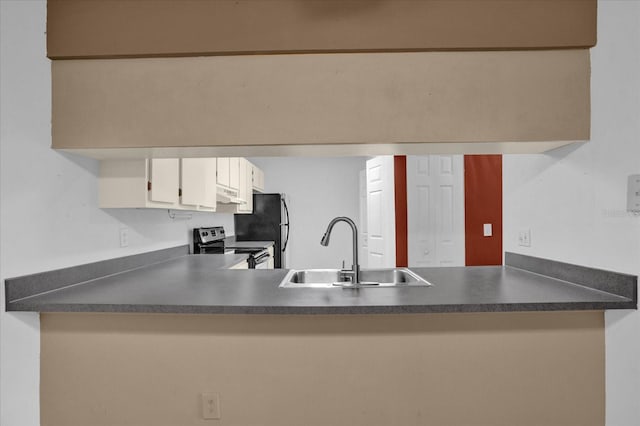 kitchen featuring white cabinetry, appliances with stainless steel finishes, and sink