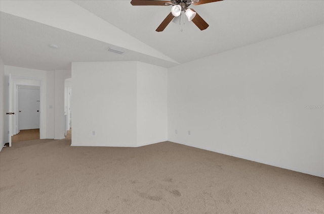 14646 Brightwell Ct, Orlando, FL 32824 - unfurnished room with light carpet, ceiling fan, and vaulted ceiling