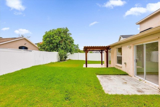 view of yard with a pergola and a patio area