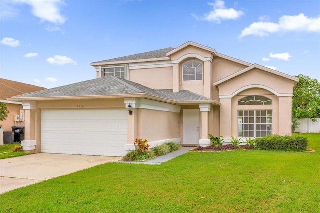14646 Brightwell Ct, Orlando, FL 32824 - traditional-style house with a garage, driveway, a front yard, stucco siding, and roof with shingles
