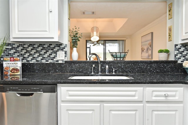 kitchen featuring dishwasher, decorative backsplash, white cabinetry, and sink