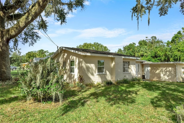 exterior space with a yard