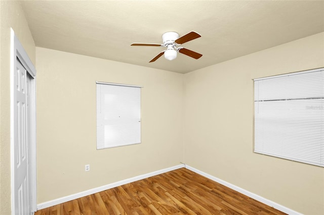 interior space with hardwood / wood-style floors, ceiling fan, and a textured ceiling