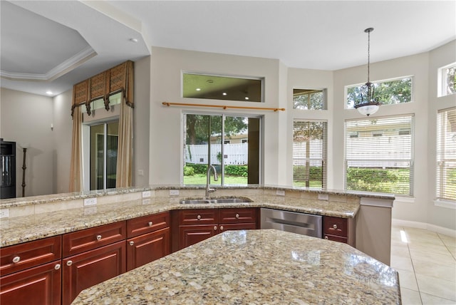 kitchen featuring stainless steel dishwasher, a wealth of natural light, sink, and crown molding