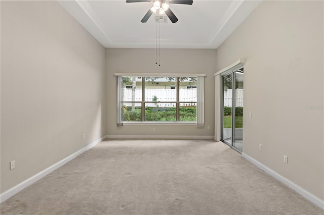 unfurnished room featuring light carpet and ceiling fan