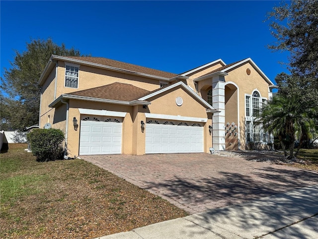 view of front property with a garage