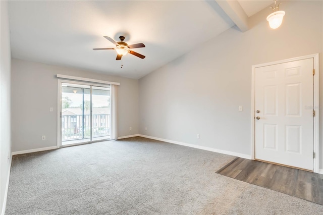 carpeted empty room with lofted ceiling with beams and ceiling fan