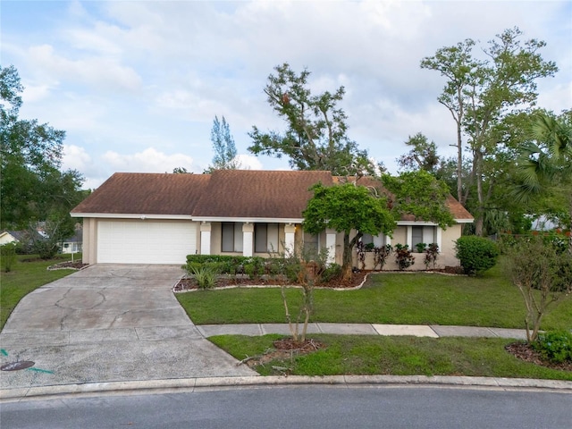 single story home with a front lawn and a garage