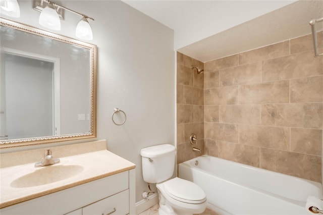 full bathroom with tiled shower / bath, toilet, and vanity