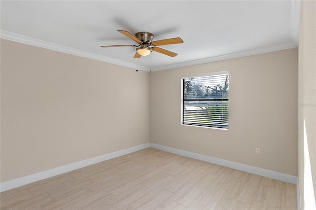 spare room featuring ceiling fan and crown molding