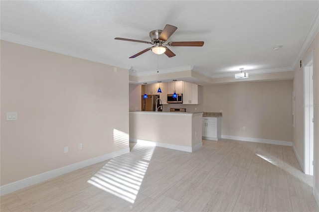 unfurnished living room with ceiling fan, crown molding, and light hardwood / wood-style flooring