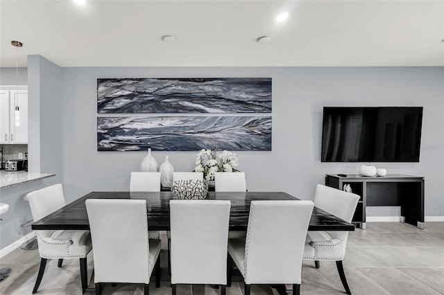 view of tiled dining space