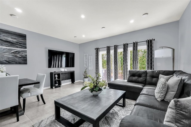 living room featuring light tile patterned floors