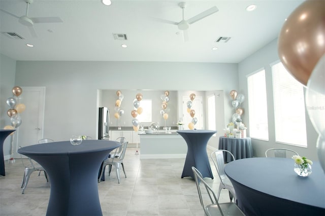 dining space featuring ceiling fan