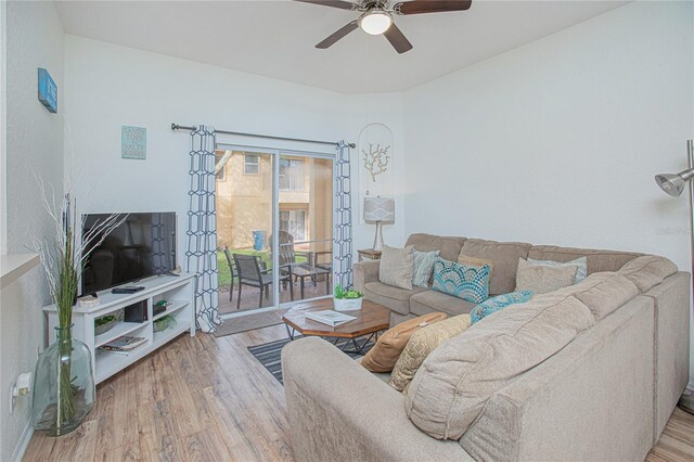 121 Palermo St, Davenport, FL 33897 - living room featuring wood finished floors and a ceiling fan