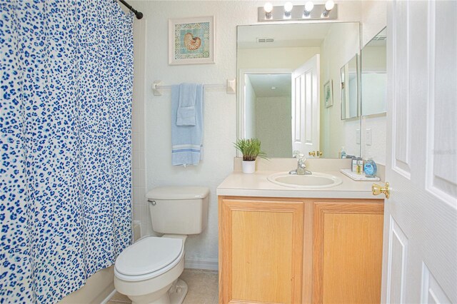 121 Palermo St, Davenport, FL 33897 - full bathroom featuring toilet, a shower with curtain, and vanity