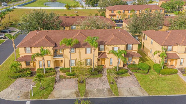 121 Palermo St, Davenport, FL 33897 - aerial perspective of suburban area with a nearby body of water