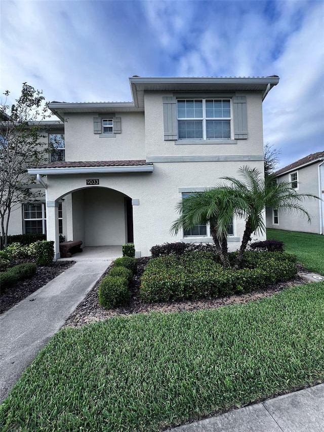 front of property with a front yard