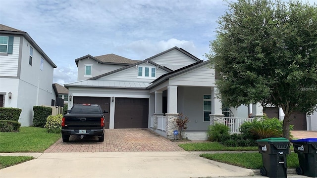 craftsman-style house with a front yard and a porch