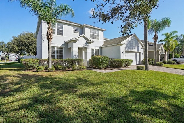 view of front of home featuring a garage and a front yard