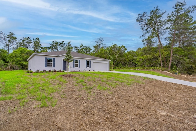 ranch-style home with a garage