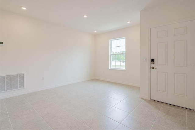 view of tiled spare room