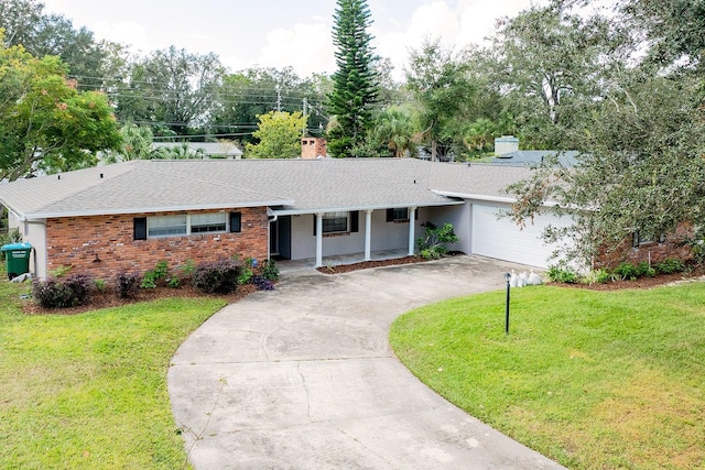 single story home featuring a garage, a front lawn, and covered porch