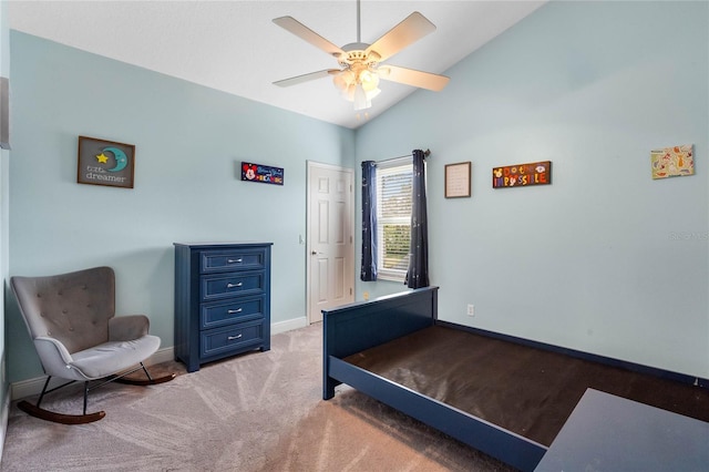 bedroom featuring vaulted ceiling, carpet flooring, and ceiling fan