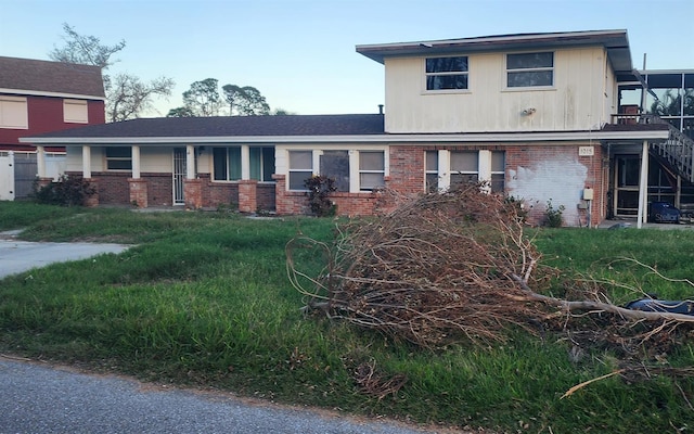 view of front of home with a front yard