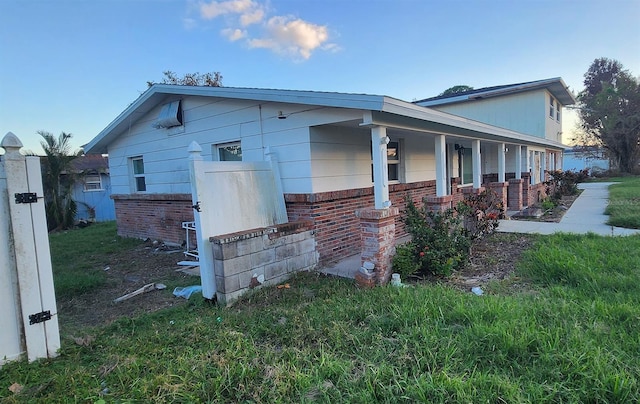 view of home's exterior featuring covered porch