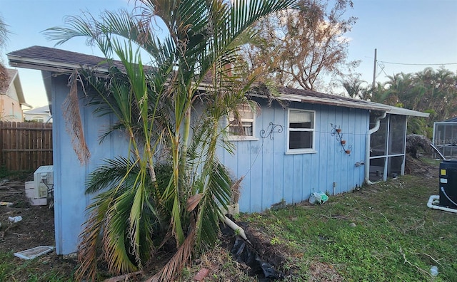 view of property exterior featuring a yard