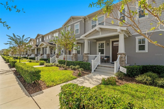 view of front of property featuring covered porch