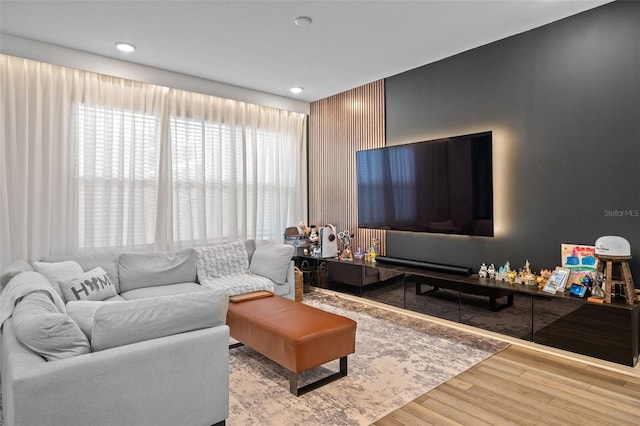 living room with light hardwood / wood-style flooring