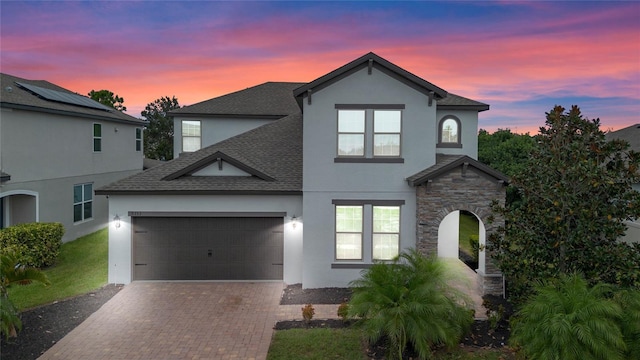 view of front of home with a garage