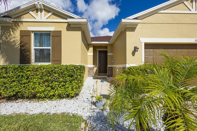 entrance to property featuring a garage